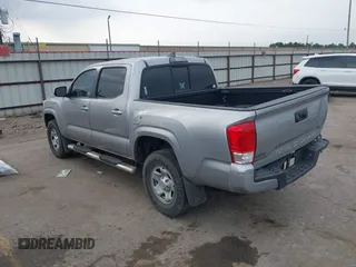 2017 Toyota Tacoma SR with VIN 5TFAX5GN6HX083614, listed as a IAAI auction lot 42314254 with 104,407 mi miles and . Bid and sale history available at DreamBid. Image 3.