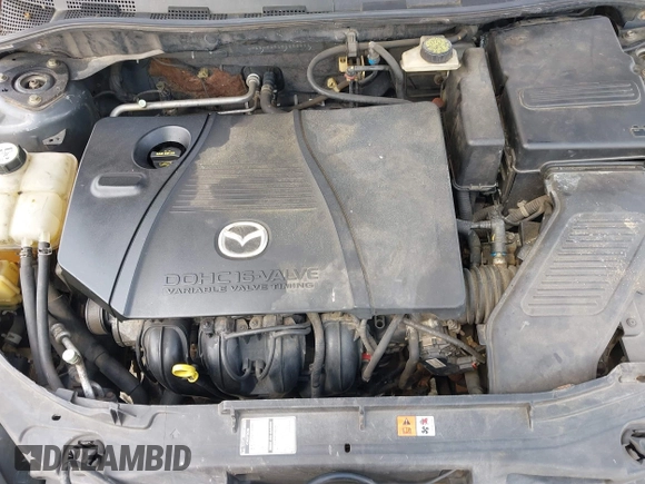 2005 Mazda 3 s with VIN JM1BK343151259901, listed as a IAAI auction lot 42028513 with 209,689 mi miles. Bid and sale history available at carsss.com. Image 10.