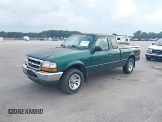 1999 Ford Ranger XLT with VIN 1FTYR14X7XTB05617, listed as a IAAI auction lot 42779315 with 107,226 mi miles and . Bid and sale history available at DreamBid. Image 2.