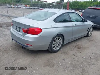 2014 BMW 4 Series 435i xDrive z VIN WBA3R5C54EF784725, wystawiony jako IAAI lot #42291673 z przebiegiem 107 124 mil mil oraz . Historia ofert i sprzedaży dostępna na DreamBid. Obrazek 4.
