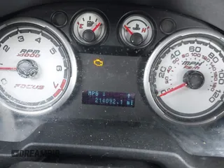 2009 Ford Focus SES with VIN 1FAHP36N89W125573, listed as a IAAI auction lot 42096198 with 214,092 mi miles and . Bid and sale history available at DreamBid. Image 7.