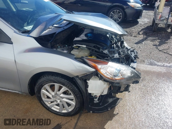 2012 Mazda Mazda3 i Touring with VIN JM1BL1V72C1579695, listed as a IAAI auction lot 41581364 with 126,535 mi miles. Bid and sale history available at carsss.com. Image 18.