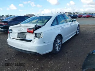 2018 Audi A6 Premium with VIN WAUC8AFC0JN097103, listed as a IAAI auction lot 41399918 with 115,014 mi miles. Bid and sale history available at carsss.com. Image 4.