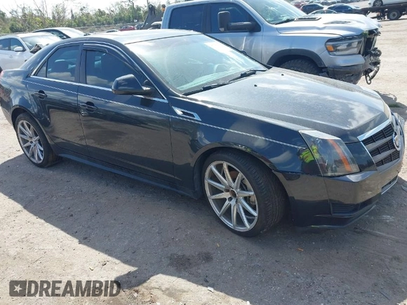 2011 Cadillac CTS Sedan Luxury with VIN 1G6DH5EY8B0116879, listed as a IAAI auction lot 41708842 with 124,550 mi miles. Bid and sale history available at carsss.com. Image 1.