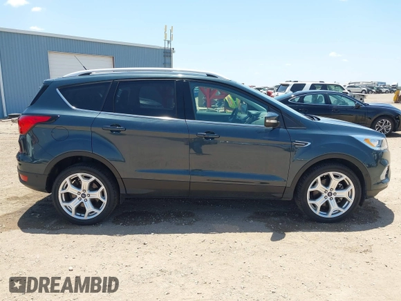 2019 Ford Escape Titanium с VIN 1FMCU9J92KUB56244, выставлен на аукционе IAAI как лот 42553011 с пробегом 37 201 миль миль и . История ставок и продаж доступна на DreamBid. Изображение 13.