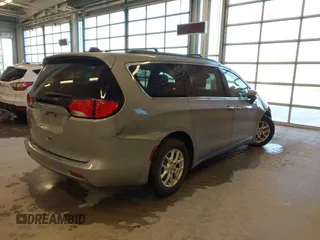 2021 Chrysler Voyager LXi with VIN 2C4RC1DG2MR506453, listed as a IAAI auction lot 41770938 with 90,255 mi miles and . Bid and sale history available at DreamBid. Image 4.