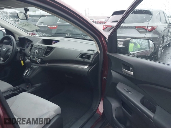 2015 Honda CR-V LX with VIN 2HKRM4H37FH695347, listed as a IAAI auction lot 41124018 with 117,400 mi miles and . Bid and sale history available at DreamBid. Image 5.