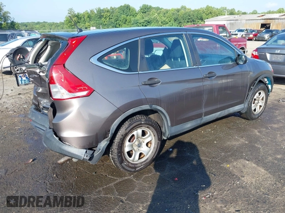 2013 Honda CR-V LX with VIN 3CZRM3H31DG703436, listed as a IAAI auction lot 42702584 with 140,013 mi miles and . Bid and sale history available at DreamBid. Image 4.