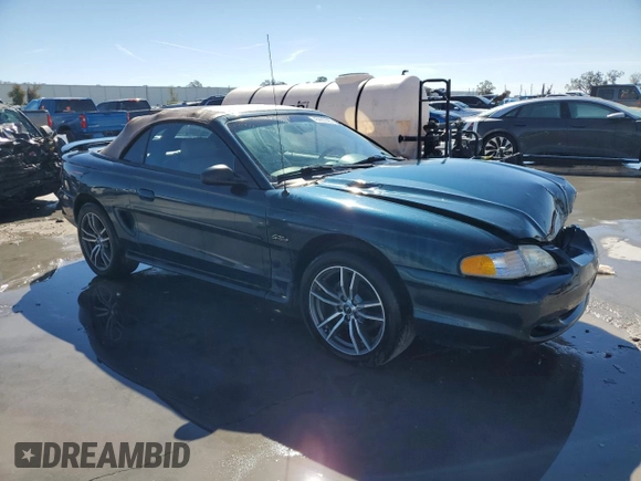 1996 Ford Mustang GT with VIN 1FALP45XXTF235504, listed as a Copart auction lot 45662595 with 57,849 mi miles and Salvage title. Bid and sale history available at DreamBid. Image 4.