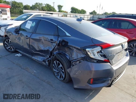 2017 Honda Civic EX z VIN 19XFC2F7XHE056273, wystawiony jako IAAI lot #42087934 z przebiegiem 95 871 mil mil oraz . Historia ofert i sprzedaży dostępna na DreamBid. Obrazek 3.