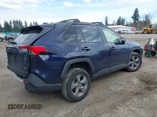 2023 Toyota RAV4 XLE with VIN JTMP1RFV1PD095688, listed as a IAAI auction lot 41874720 with 59,737 mi miles. Bid and sale history available at carsss.com. Image 4.