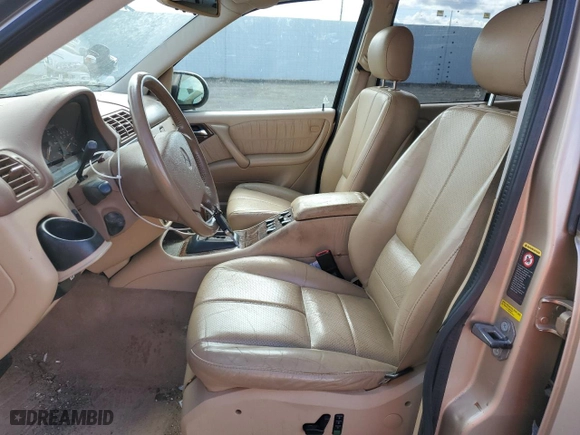 2001 Mercedes-Benz M-Class with VIN 4JGAB72EX1A243970, listed as a Copart auction lot 61308054 with 133,461 mi miles and Salvage Title. Bid and sale history available at carsss.com. Image 7.