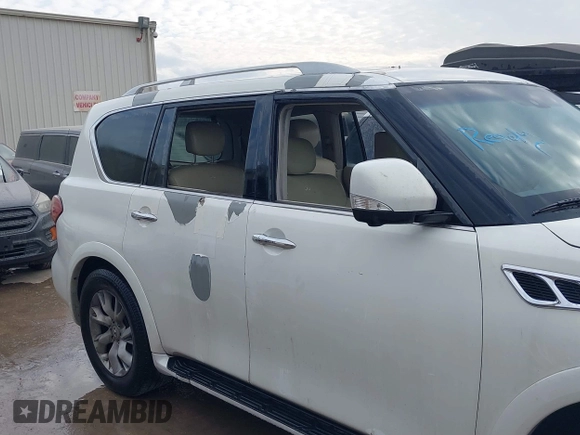 2011 Infiniti QX56 7-passenger with VIN JN8AZ2NF0B9500391, listed as a IAAI auction lot 41001635 with 166,100 mi miles and . Bid and sale history available at DreamBid. Image 6.