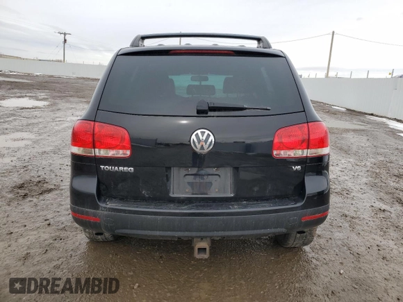 2004 Volkswagen Touareg z VIN WVGBC77LX4D062055, wystawiony jako Copart lot #45960445 z przebiegiem 201 819 mil mil oraz Szkoda całkowita • Salvage title. Historia ofert i sprzedaży dostępna na DreamBid. Obrazek 6.