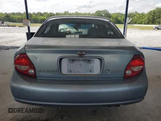 2000 Nissan Maxima GXE with VIN JN1CA31A1YT223132, listed as a Copart auction lot 60148655 with 269,258 mi miles and Salvage title. Bid and sale history available at DreamBid. Image 6.