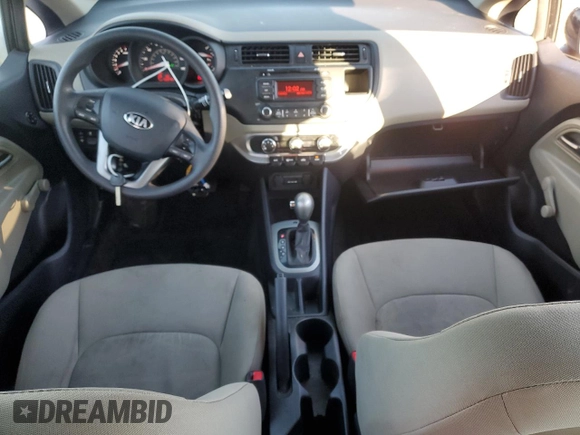 2014 Kia Rio LX with VIN KNADM5A39E6358548, listed as a Copart auction lot 83212984 with 132,272 mi miles and Salvage Title. Bid and sale history available at carsss.com. Image 8.