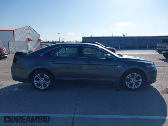 2016 Ford Taurus SEL with VIN 1FAHP2E88GG157761, listed as a IAAI auction lot 41937397 with 129,142 mi miles and . Bid and sale history available at DreamBid. Image 13.
