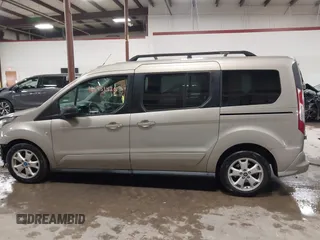 2015 Ford Transit Connect XLT z VIN NM0GS9F75F1183168, wystawiony jako IAAI lot #41951420 z przebiegiem 211 444 mil mil oraz . Historia ofert i sprzedaży dostępna na DreamBid. Obrazek 14.