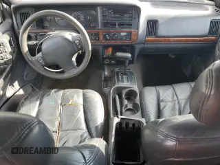 1997 Jeep Grand Cherokee Limited with VIN 1J4GZ78Y0VC556381, listed as a Copart auction lot 46221845 with 191,778 mi miles and Salvage Title. Bid and sale history available at carsss.com. Image 8.