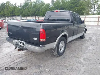 2003 Ford F-150 XL with VIN 1FTRX17L13NA01819, listed as a IAAI auction lot 42719787 with Not provided miles and . Bid and sale history available at DreamBid. Image 4.