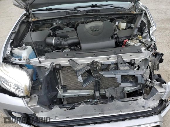 2021 Toyota Tacoma SR5 z VIN 3TYAZ5CN5MT004373, wystawiony jako Copart lot #58526145 z przebiegiem Nie podano mil oraz Szkoda całkowita • Salvage title. Historia ofert i sprzedaży dostępna na DreamBid. Obrazek 11.