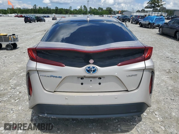 2021 Toyota Prius LE with VIN JTDKAMFPXM3184126, listed as a Copart auction lot 56857675 with 54,676 mi miles and Clean Title. Bid and sale history available at DreamBid. Image 6.