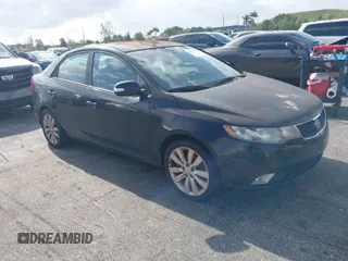 2010 Kia Forte SX with VIN KNAFW4A31A5310586, listed as a IAAI auction lot 41964278 with 1 mi miles. Bid and sale history available at carsss.com. Image 1.