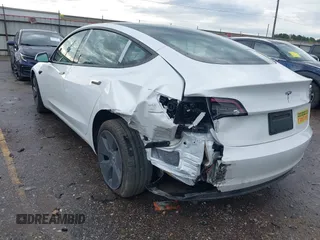 2023 Tesla Model 3 z VIN 5YJ3E1EA0PF511158, wystawiony jako IAAI lot #42210455 z przebiegiem 22 291 mil mil oraz . Historia ofert i sprzedaży dostępna na DreamBid. Obrazek 3.