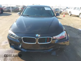 2014 BMW 3 Series 328i with VIN WBA3C1C55EK117180, listed as a IAAI auction lot 41389969 with 163,760 mi miles. Bid and sale history available at carsss.com. Image 12.