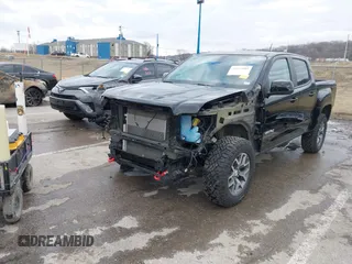 2022 GMC Canyon 4WD AT4 with VIN 1GTG6FEN0N1249453, listed as a IAAI auction lot 41513689 with 44,285 mi miles and . Bid and sale history available at carsss.com. Image 6.