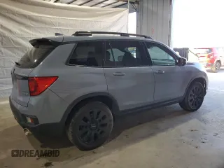 2023 Honda Passport Elite with VIN 5FNYF8H03PB034613, listed as a Copart auction lot 54009215 with 102,841 mi miles and Salvage title. Bid and sale history available at DreamBid. Image 3.