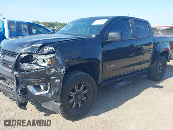 2020 Chevrolet Colorado 2WD Z71 z VIN 1GCGSDEN2L1122555, wystawiony jako IAAI lot #42096724 z przebiegiem 120 679 mil mil oraz . Historia ofert i sprzedaży dostępna na DreamBid. Obrazek 2.