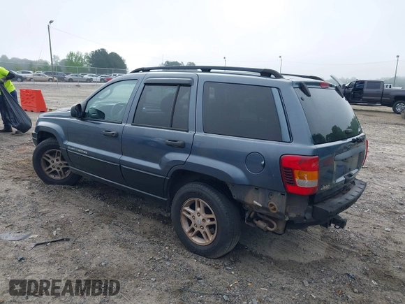 2002 Jeep Grand Cherokee Laredo z VIN 1J4GX48S62C201579, wystawiony jako IAAI lot #42102238 z przebiegiem 262 630 mil mil oraz . Historia ofert i sprzedaży dostępna na DreamBid. Obrazek 3.