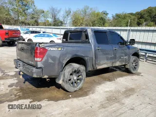 2015 Nissan Titan SL with VIN 1N6BA0EC5FN509230, listed as a Copart auction lot 73983574 with 144,288 mi miles and Salvage Title. Bid and sale history available at carsss.com. Image 3.