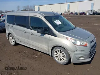 2016 Ford Transit Connect XLT z VIN NM0GS9F75G1285765, wystawiony jako IAAI lot #41795230 z przebiegiem 178 412 mil mil oraz . Historia ofert i sprzedaży dostępna na DreamBid. Obrazek 1.