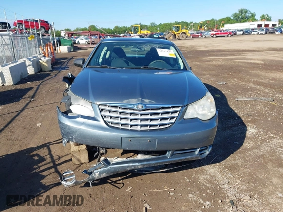 2010 Chrysler Sebring Touring z VIN 1C3CC4FB0AN128655, wystawiony jako IAAI lot #42311837 z przebiegiem 205 720 mil mil oraz . Historia ofert i sprzedaży dostępna na DreamBid. Obrazek 13.
