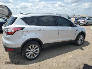 2018 Ford Escape Titanium with VIN 1FMCU9J99JUC89677, listed as a Copart auction lot 60421545 with 98,021 mi miles and Salvage title. Bid and sale history available at DreamBid. Image 3.