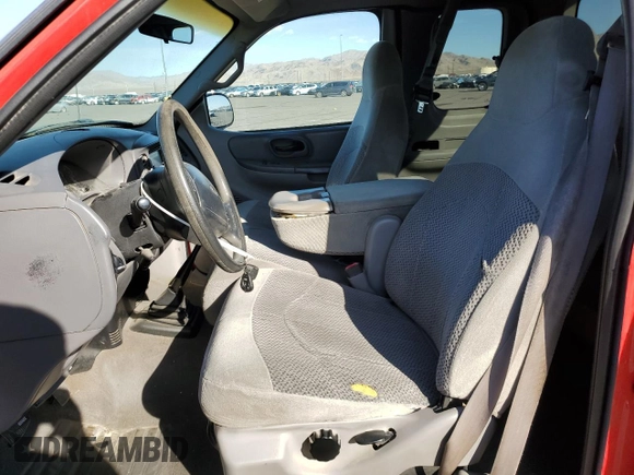 1999 Ford F-150 with VIN 1FTRX07W2XKC24186, listed as a Copart auction lot 74553294 with Not provided miles and Salvage title. Bid and sale history available at DreamBid. Image 7.