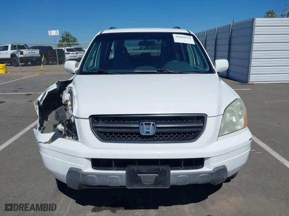 2004 Honda Pilot EX with VIN 2HKYF18424H564482, listed as a IAAI auction lot 41868124 with 173,484 mi miles. Bid and sale history available at carsss.com. Image 12.