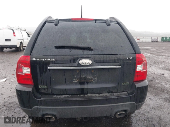 2009 Kia Sportage LX with VIN KNDJE723497612745, listed as a IAAI auction lot 41974301 with 141,110 mi miles and . Bid and sale history available at carsss.com. Image 16.