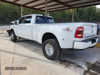 2023 Ram 3500 Laramie with VIN 3C63RRJL6PG522516, listed as a Copart auction lot 69699634 with 34,312 mi miles and Salvage Title. Bid and sale history available at carsss.com. Image 2.