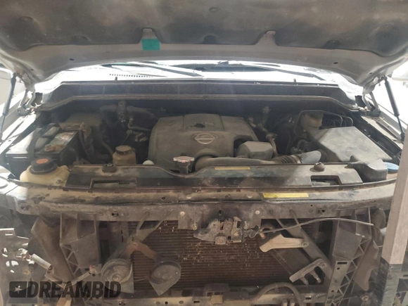 2007 Nissan Titan SE z VIN 1N6BA07B87N226908, wystawiony jako Copart lot #86951184 z przebiegiem 233 741 mil mil oraz Szkoda całkowita • Salvage title. Historia ofert i sprzedaży dostępna na DreamBid. Obrazek 13.