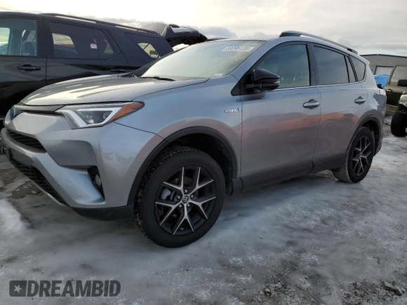 2018 Toyota RAV4 Hybrid SE z VIN JTMJJREV0JD246230, wystawiony jako Copart lot #89095135 z przebiegiem Nie podano mil oraz Szkoda całkowita • Salvage title. Historia ofert i sprzedaży dostępna na DreamBid. Obrazek 1.