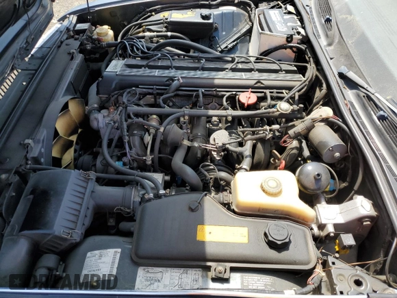 1992 Jaguar XJ with VIN SAJHY174XNC649368, listed as a Copart auction lot 50191454 with 99,553 mi miles and Salvage Title. Bid and sale history available at DreamBid. Image 11.