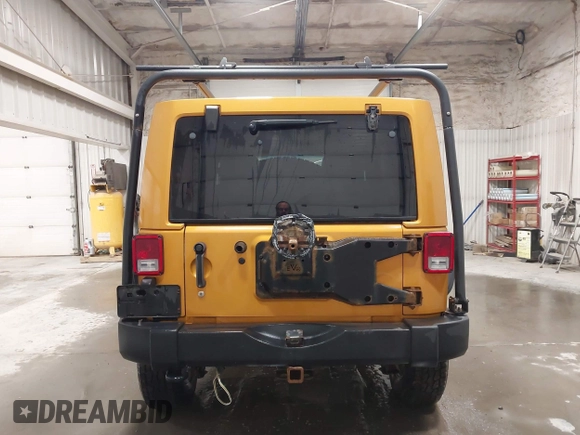 2014 Jeep Wrangler Unlimited Rubicon with VIN 1C4BJWFG7EL254534, listed as a IAAI auction lot 41279731 with 140,218 mi miles. Bid and sale history available at carsss.com. Image 16.