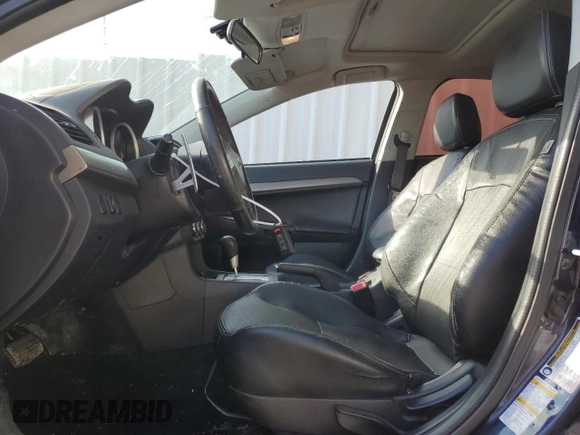 2014 Mitsubishi Lancer SE z VIN JA32V2FW2EU605184, wystawiony jako Copart lot #56007575 z przebiegiem 234 213 mil mil oraz Szkoda całkowita • Salvage title. Historia ofert i sprzedaży dostępna na DreamBid. Obrazek 7.
