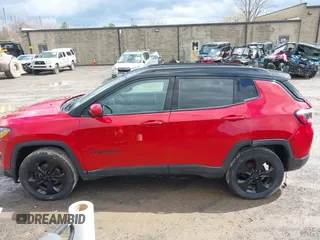 2021 Jeep Compass Altitude with VIN 3C4NJDBB3MT504477, listed as a IAAI auction lot 41886527 with 50,341 mi miles and . Bid and sale history available at DreamBid. Image 14.