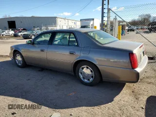 2002 Cadillac DeVille DHS z VIN 1G6KE54Y62U248629, wystawiony jako Copart lot #79825284 z przebiegiem 99 568 mil mil oraz Szkoda całkowita • Salvage title. Historia ofert i sprzedaży dostępna na DreamBid. Obrazek 2.
