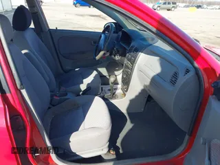 2002 Kia Rio with VIN KNADC123526160314, listed as a IAAI auction lot 41527989 with 124,252 mi miles. Bid and sale history available at carsss.com. Image 5.