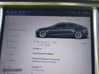 2017 Tesla Model S 100D with VIN 5YJSA1E23HF198592, listed as a IAAI auction lot 41721755 with 127,946 mi miles. Bid and sale history available at carsss.com. Image 7.